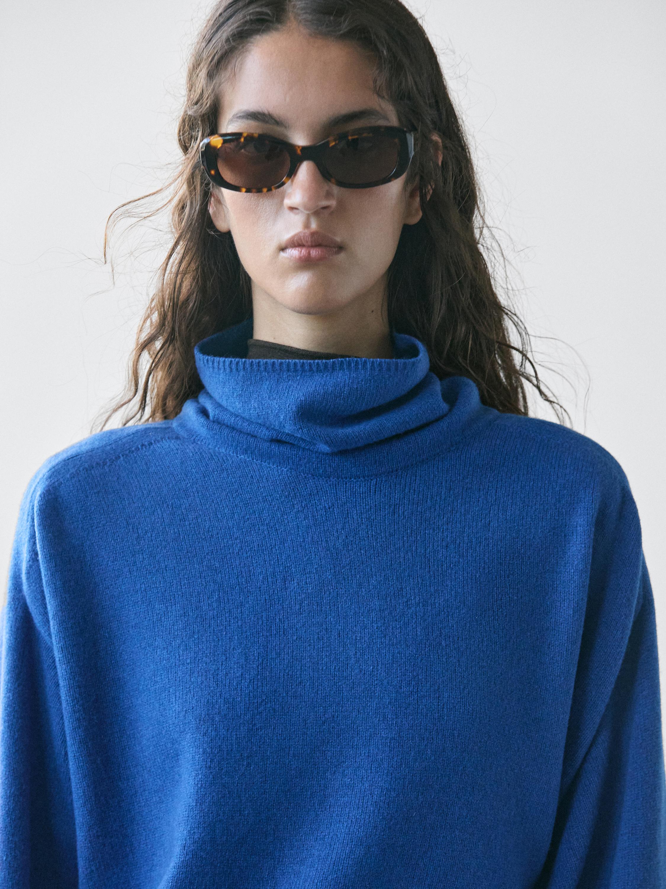 Wool blend knit sweater with high neck